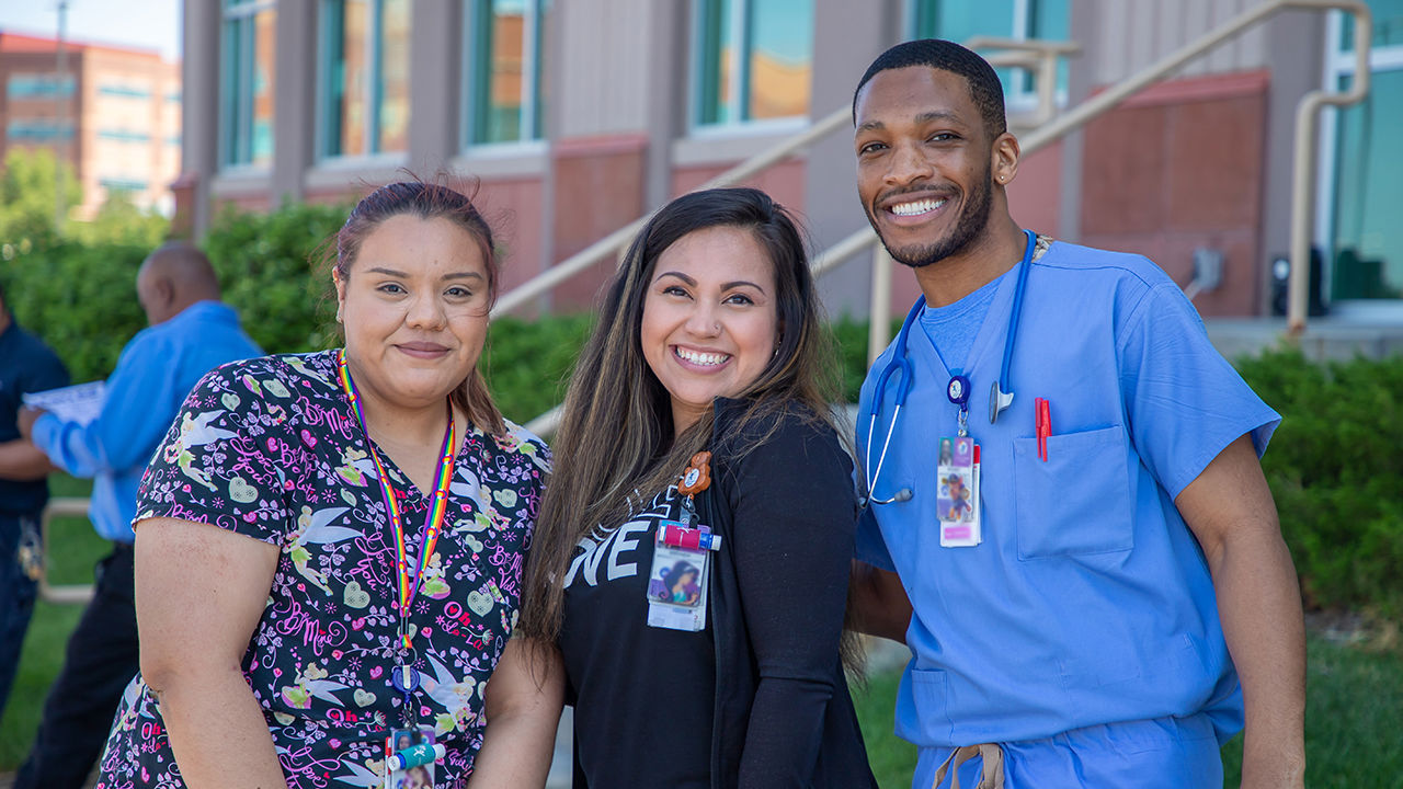 Three Children’s Colorado clinical team members smiling for the camera