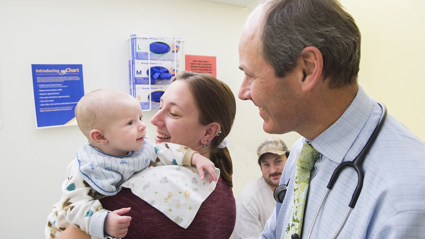 Dr. Duncan Wilcox meets with a Urology baby patient and family at Children's Hospital Colorado.