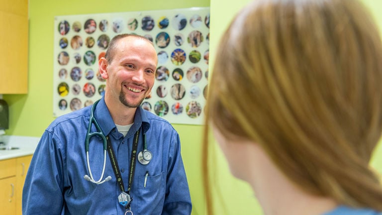 Physician with patient at Children’s Colorado’s Multidisciplinary Clinic