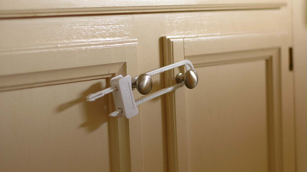 Cabinet handles with child proof lock