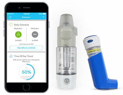 Photo showing the asthma monitoring device technology with mobile application, sensor and inhaler.