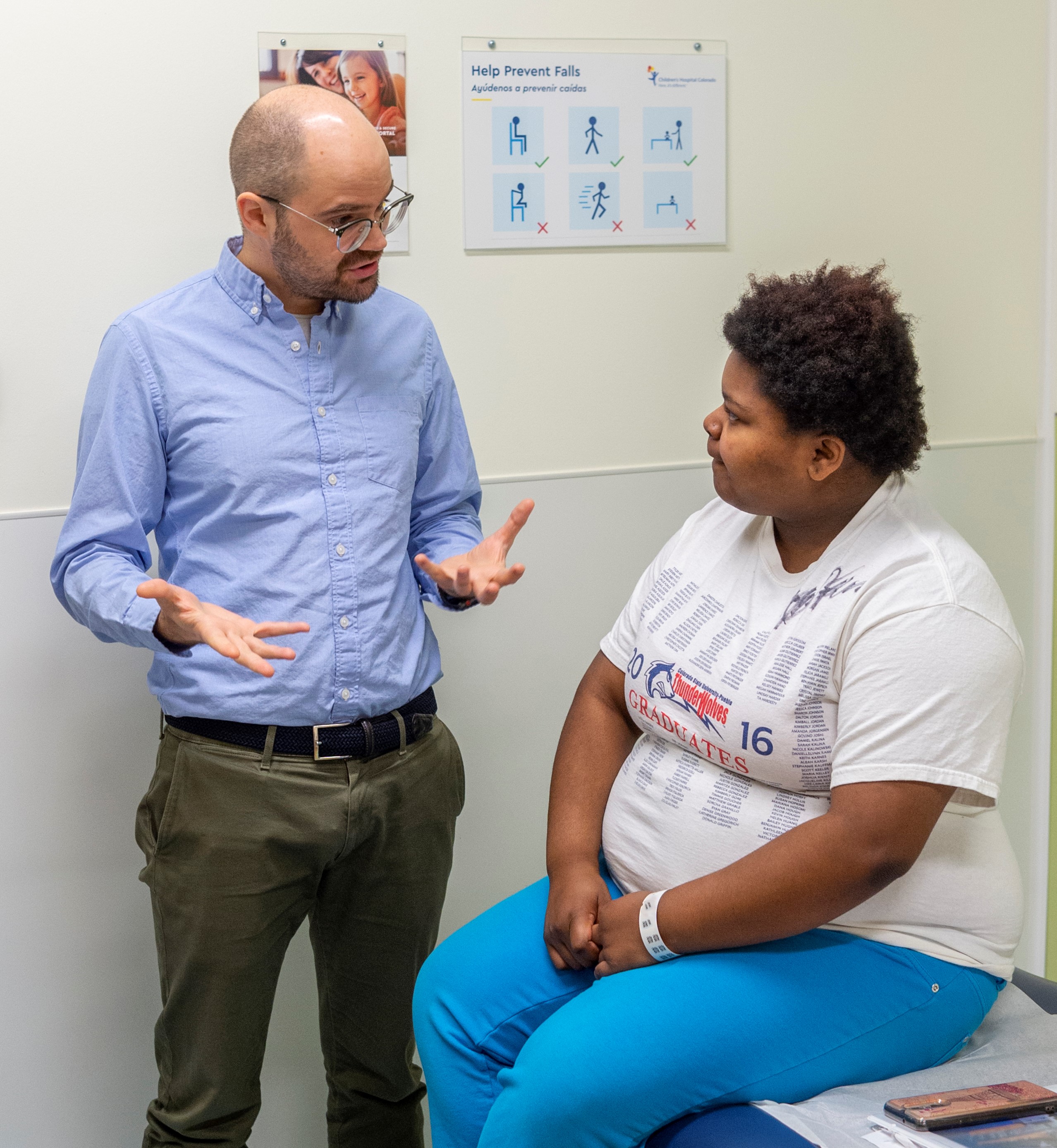 A doctor discusses bariatric treatment with a girl.